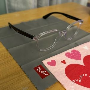 Kids authentic Ray-Ban’s new without tags black and clear frames. Very nice.